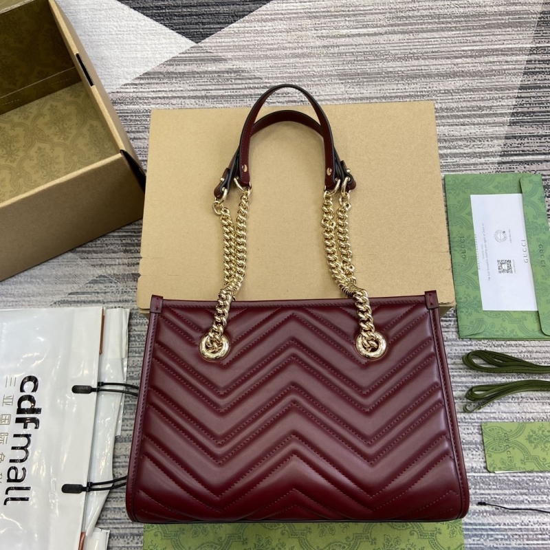 G*u*i top handle bags